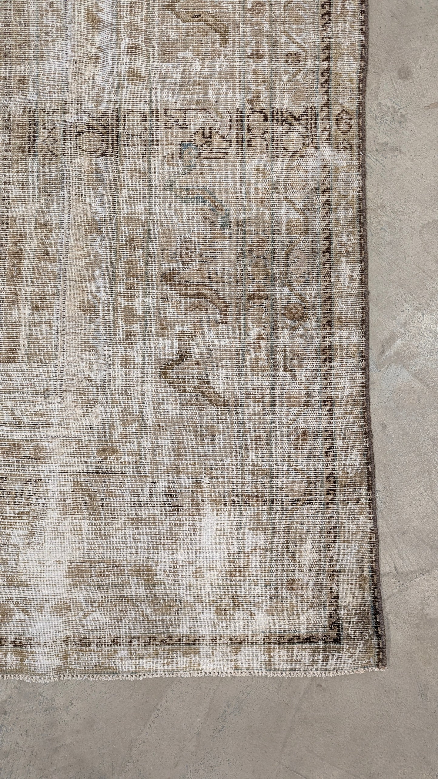 Close-up of a patterned rug.