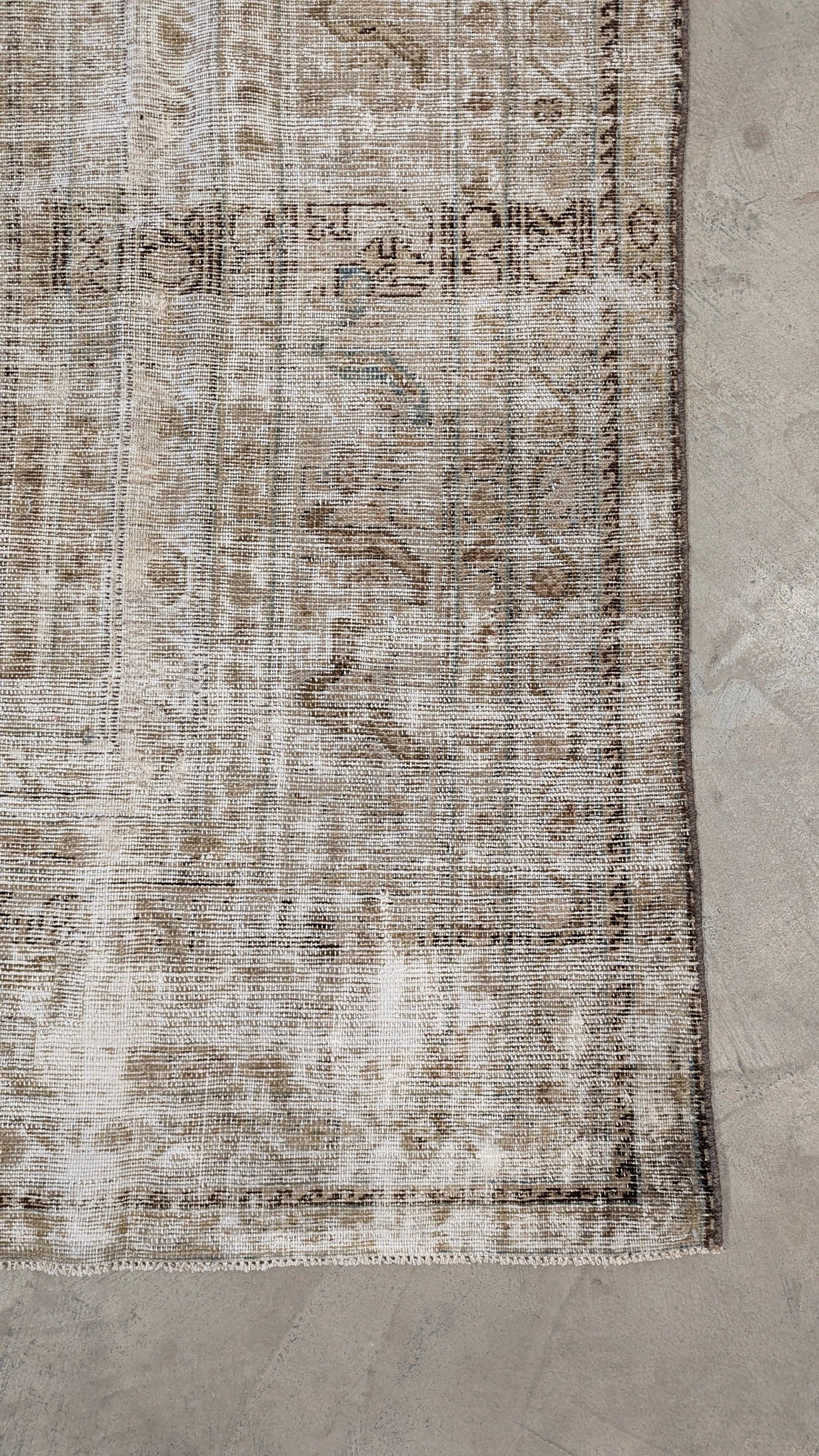 Close-up of a patterned rug.