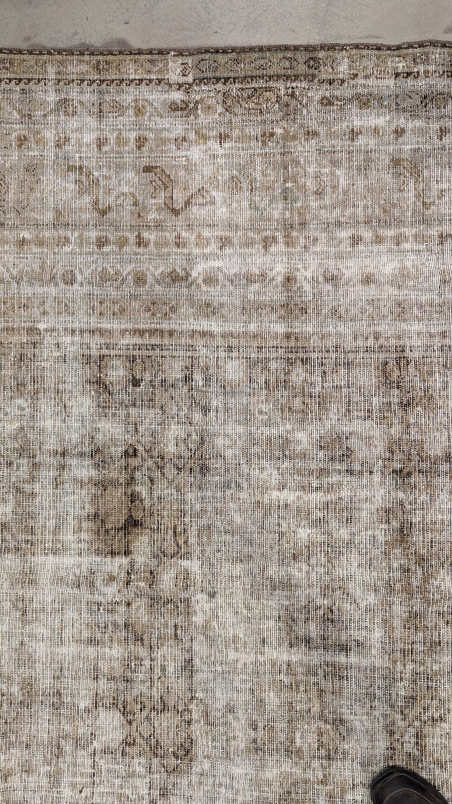 Close-up of a patterned rug.