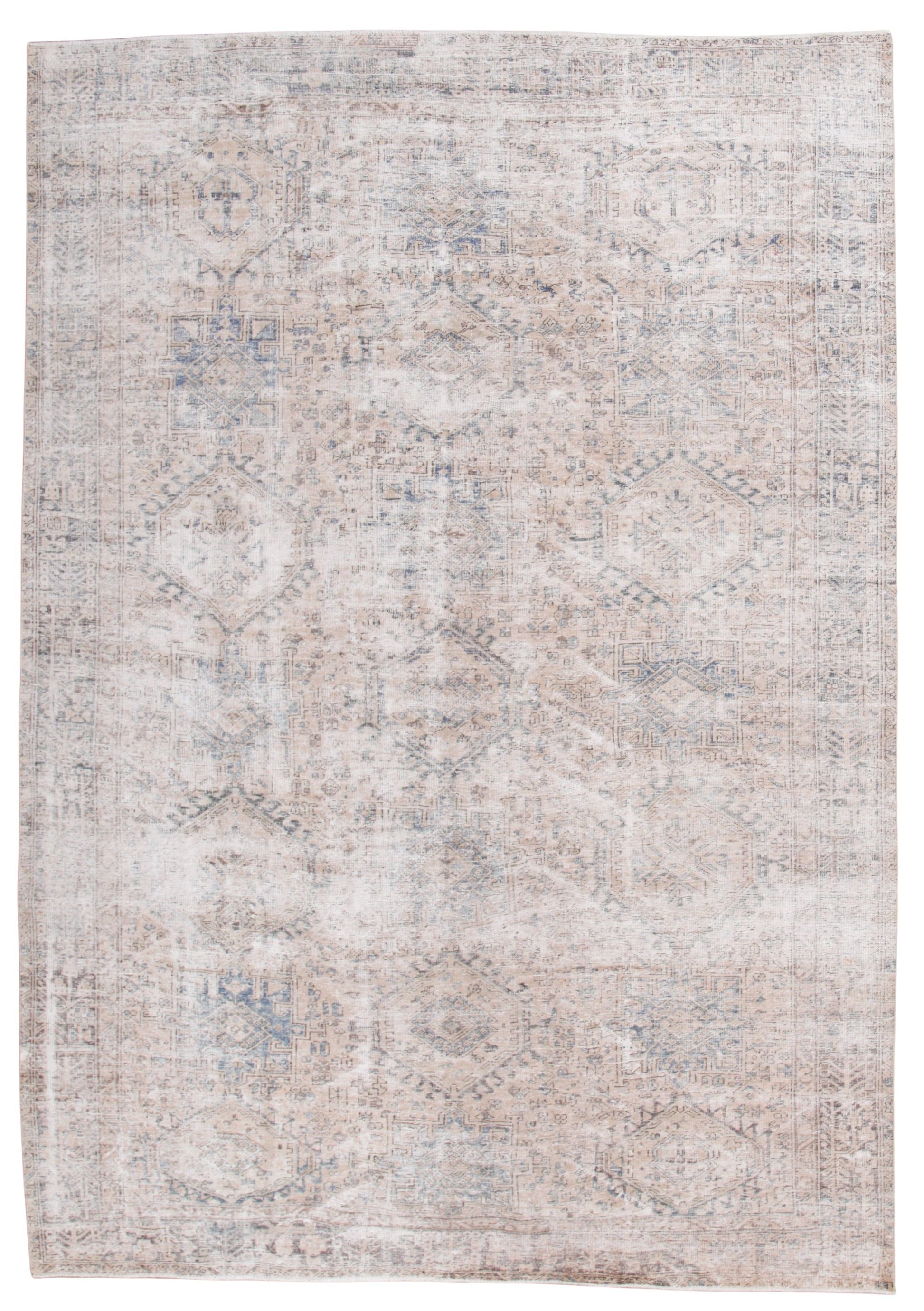 A rectangular area rug with a distressed, vintage-style pattern in soft beige, cream, and muted blue-gray tones.