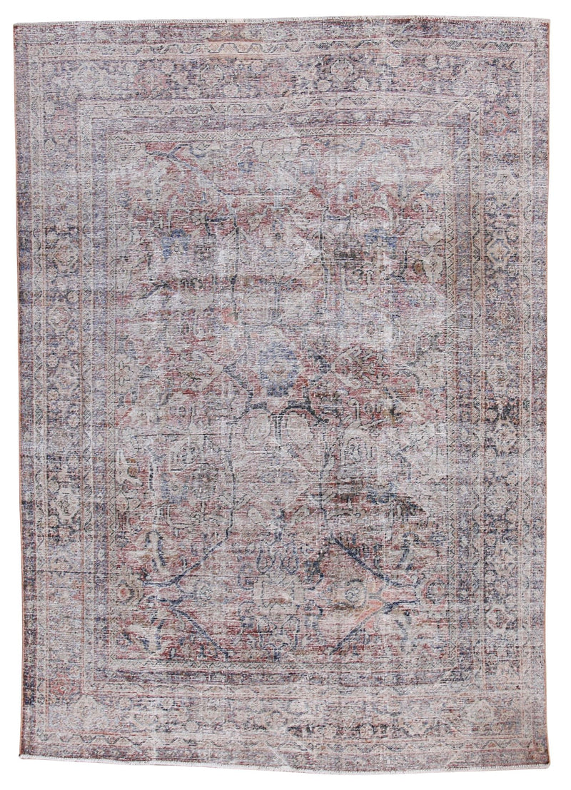 A distressed traditional oriental rug with an intricate floral and medallion pattern in faded dusty pink, beige, and muted blue-gray tones, shown flat against a white background.